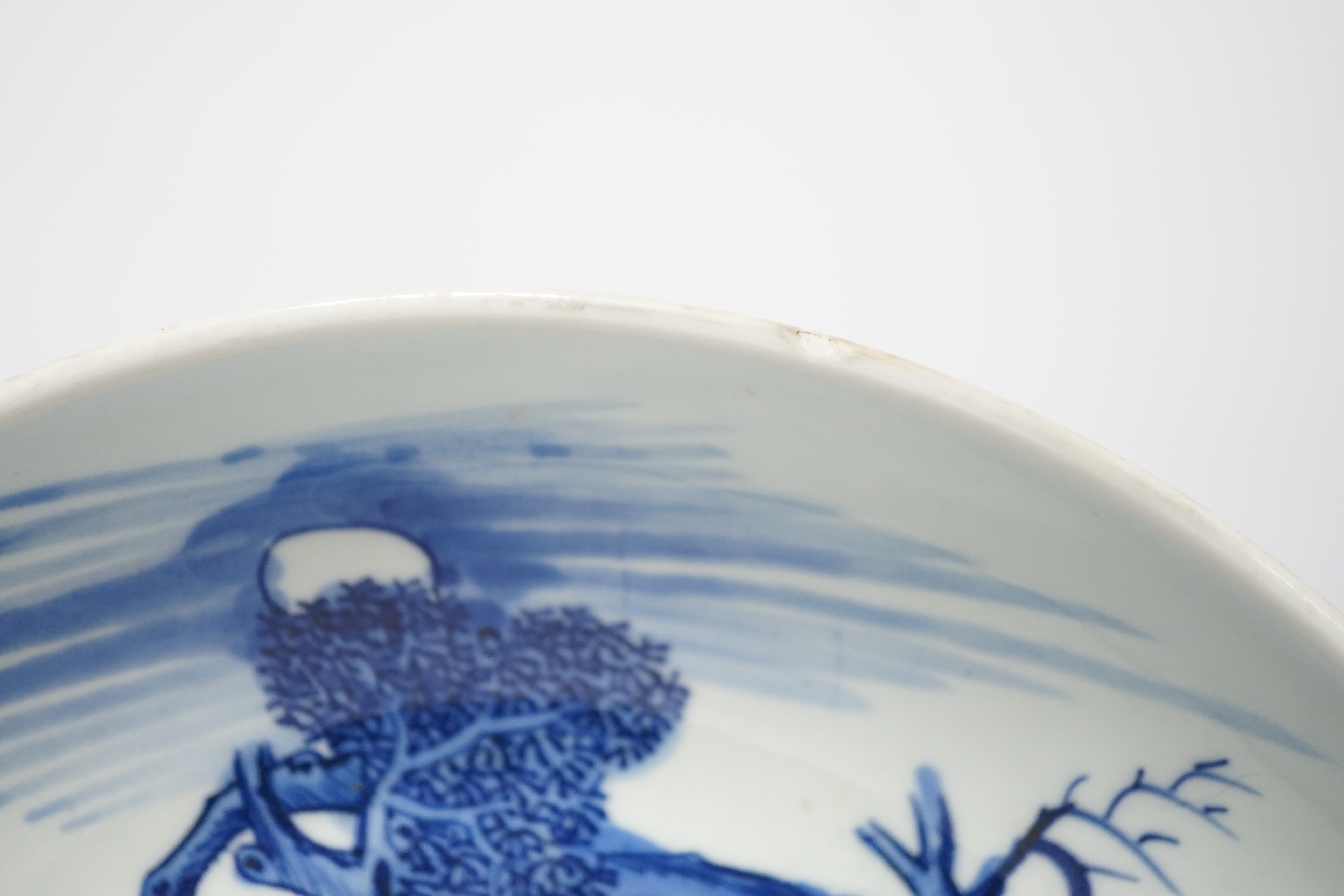 A large Chinese blue and white ‘mythical beasts’ saucer dish, Yongzheng period